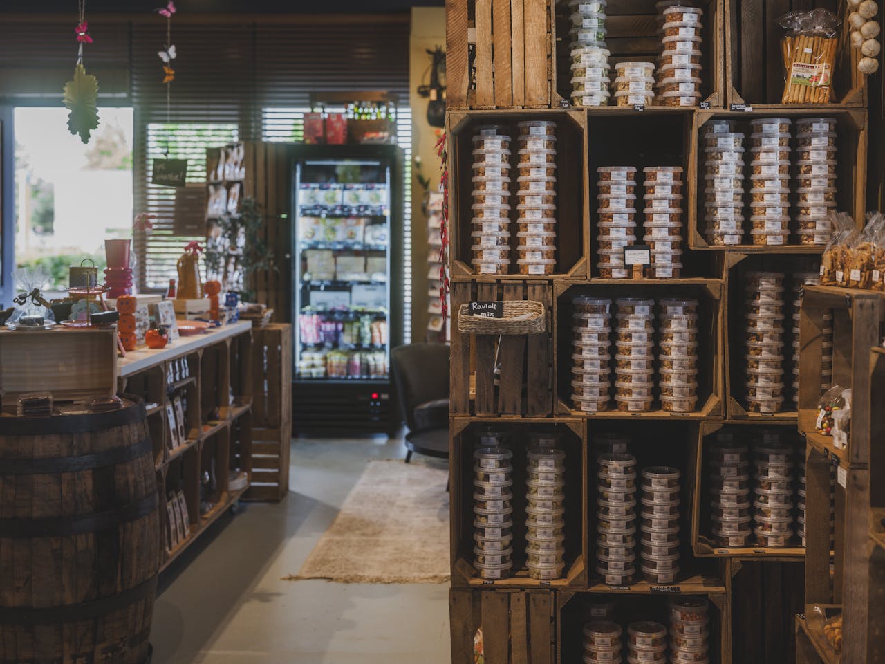 Explore a cozy local store in Almere featuring a variety of packaged nuts and rustic wooden décor.